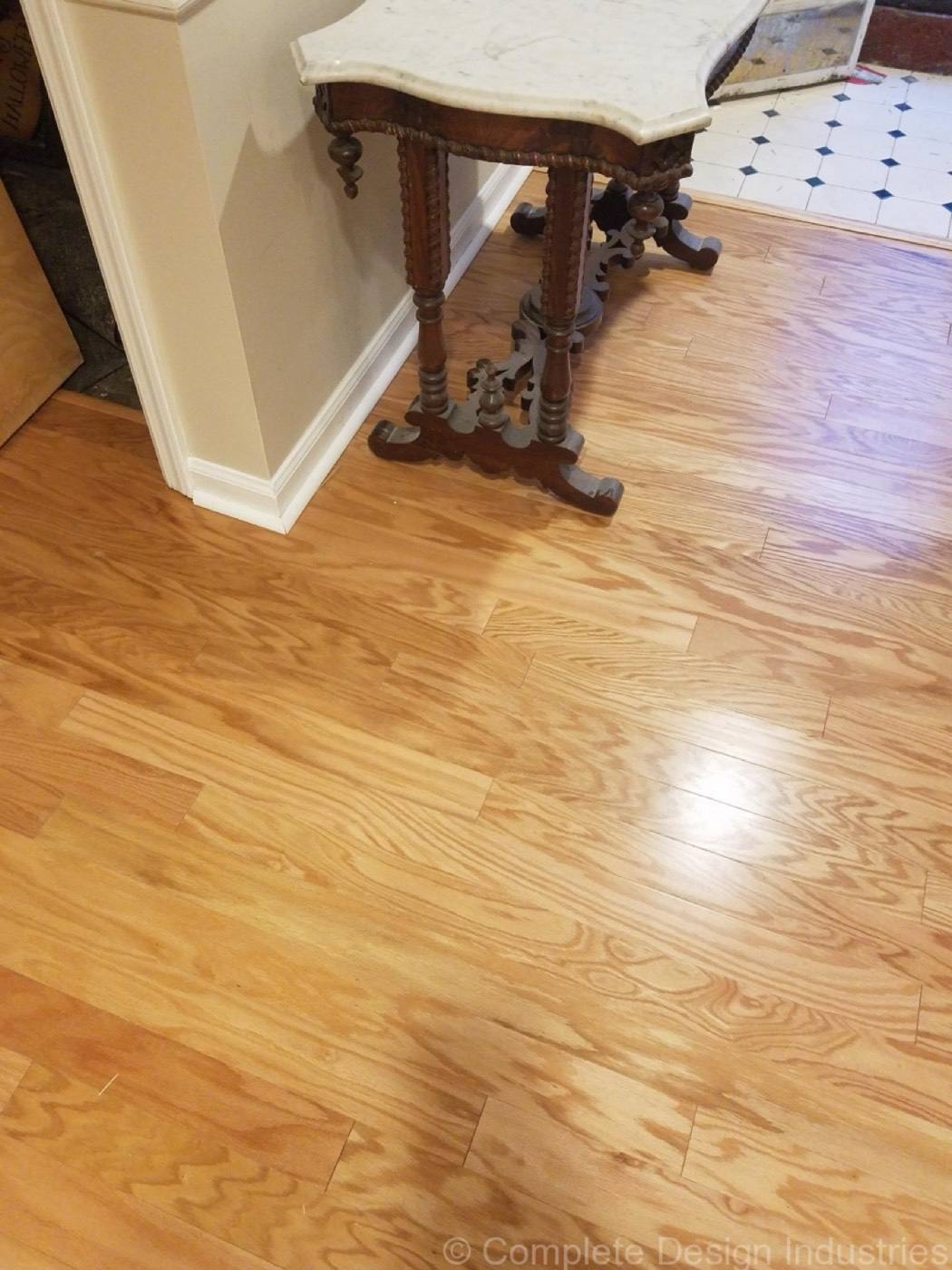 Refinished oak hardwood floor in an entry