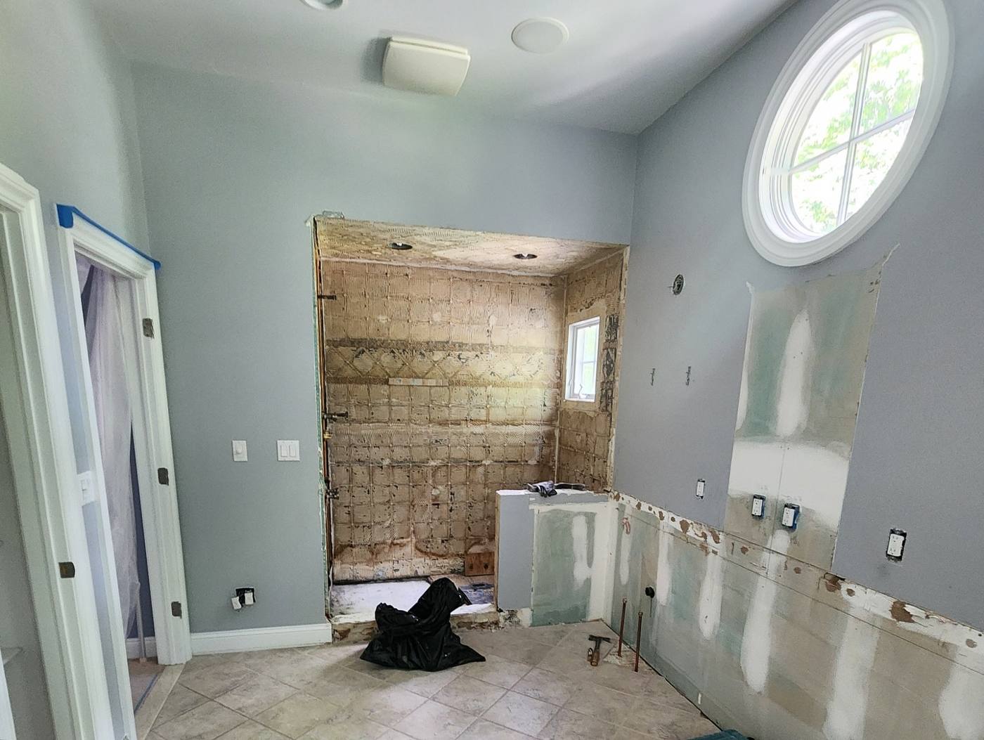 Primary bathroom stripped back during demolition