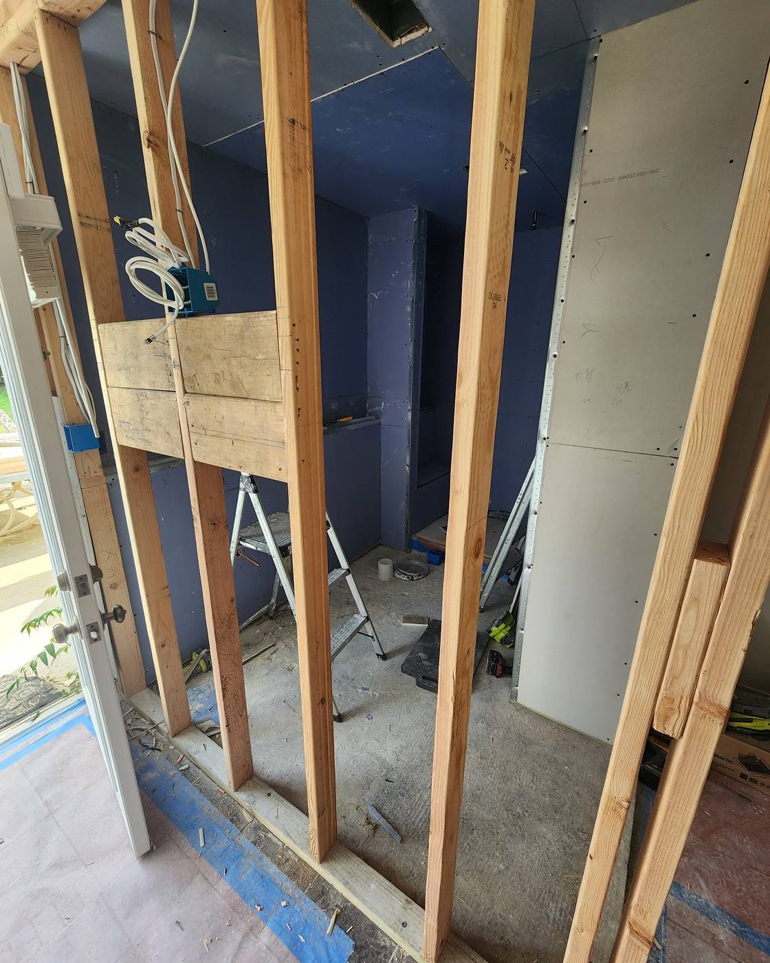 New framing to reconfigure a bathroom layout