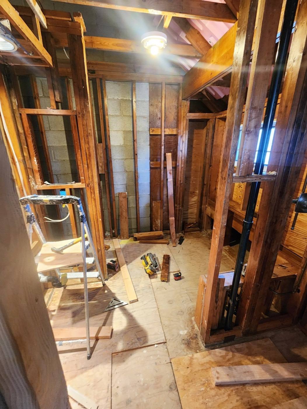 Bathroom gutted to the studs during a remodel